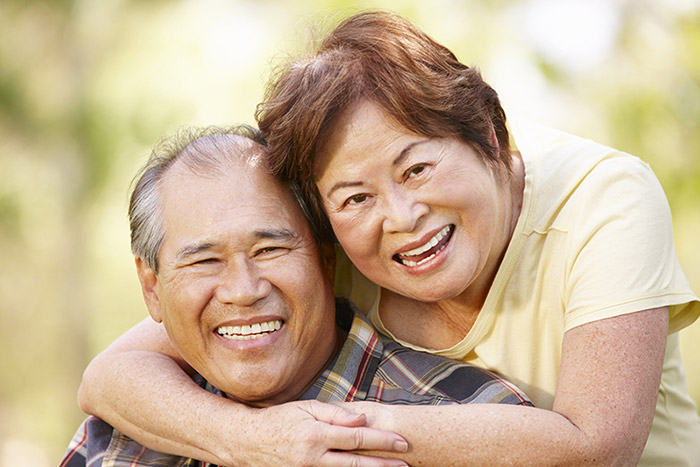 Mature couple smiling