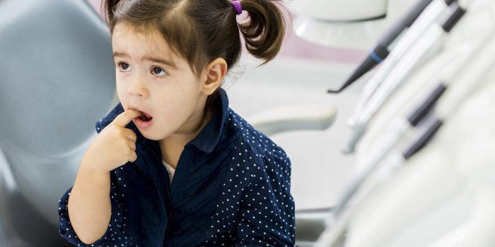 Young girl at the dentist