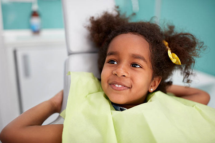 Young girl at the dentist