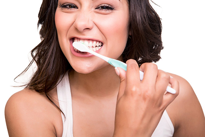 Brushing her teeth