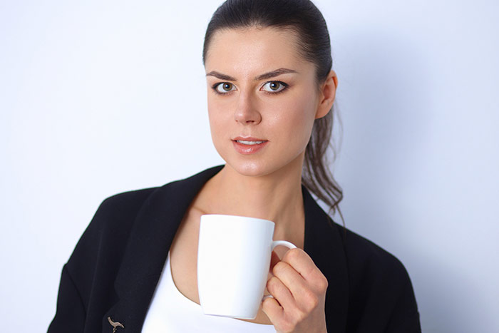 Woman drinking coffee